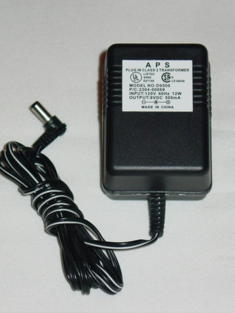 NEW APS D9500 AC Adapter 2304-00069 9V DC 500mA